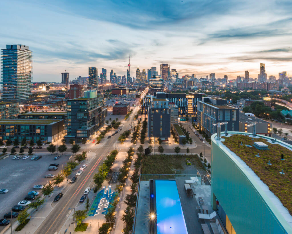 Aerial dusk photo looking down at a green roof on Canary Park Condos Canary District