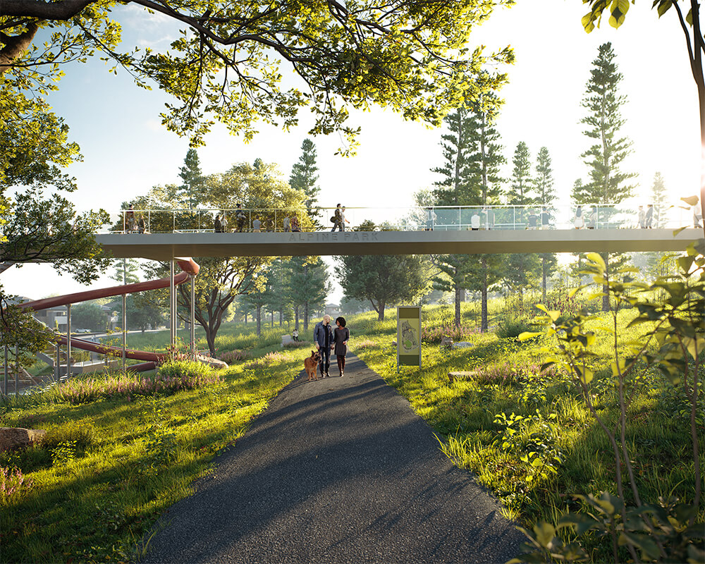 Canopy Park in Alpine Park in Calgary Alberta, a couple walking along a path under a footbridge surrounded by greenery.