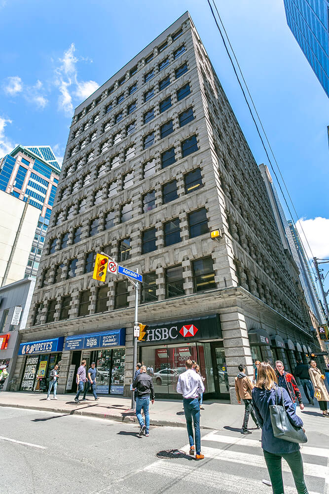 Perspective shot of Dream Office's 6. Adelaide Street on a sunny blue sky day.