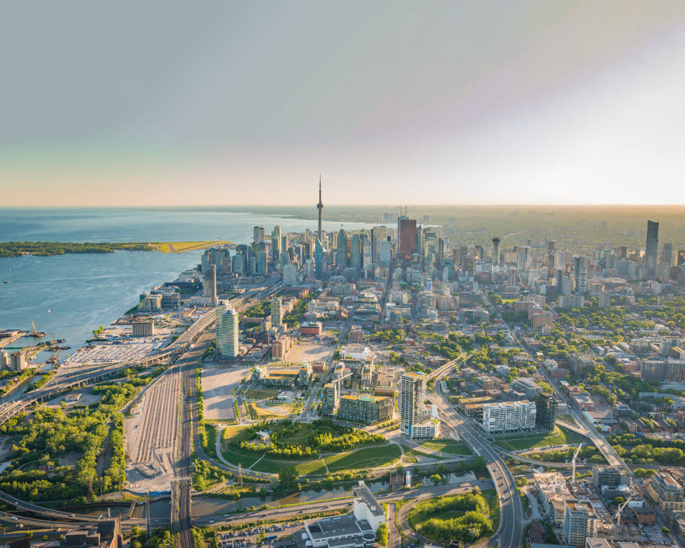 Aerial photo of the Canary District with a view of downtown Toronto's skyline.